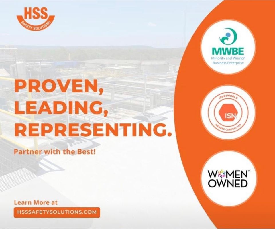 A person in orange gloves holding a blue pipe.