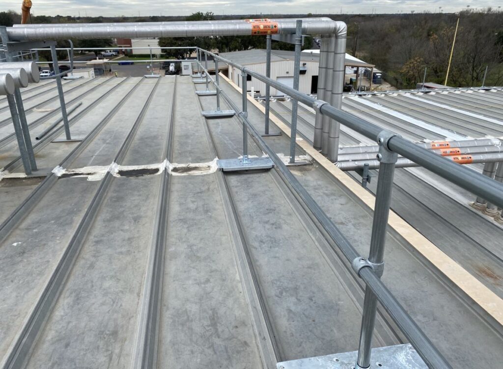 A metal railing on the side of a building.