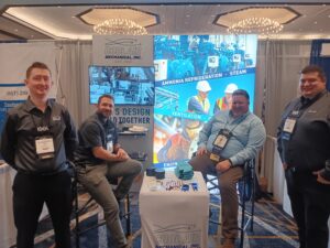 A group of people sitting around a table.