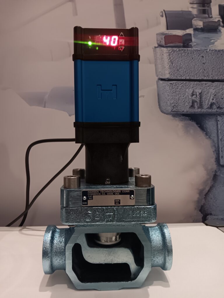 A blue and black light is on top of the valve