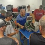 A group of people gathered around a table.